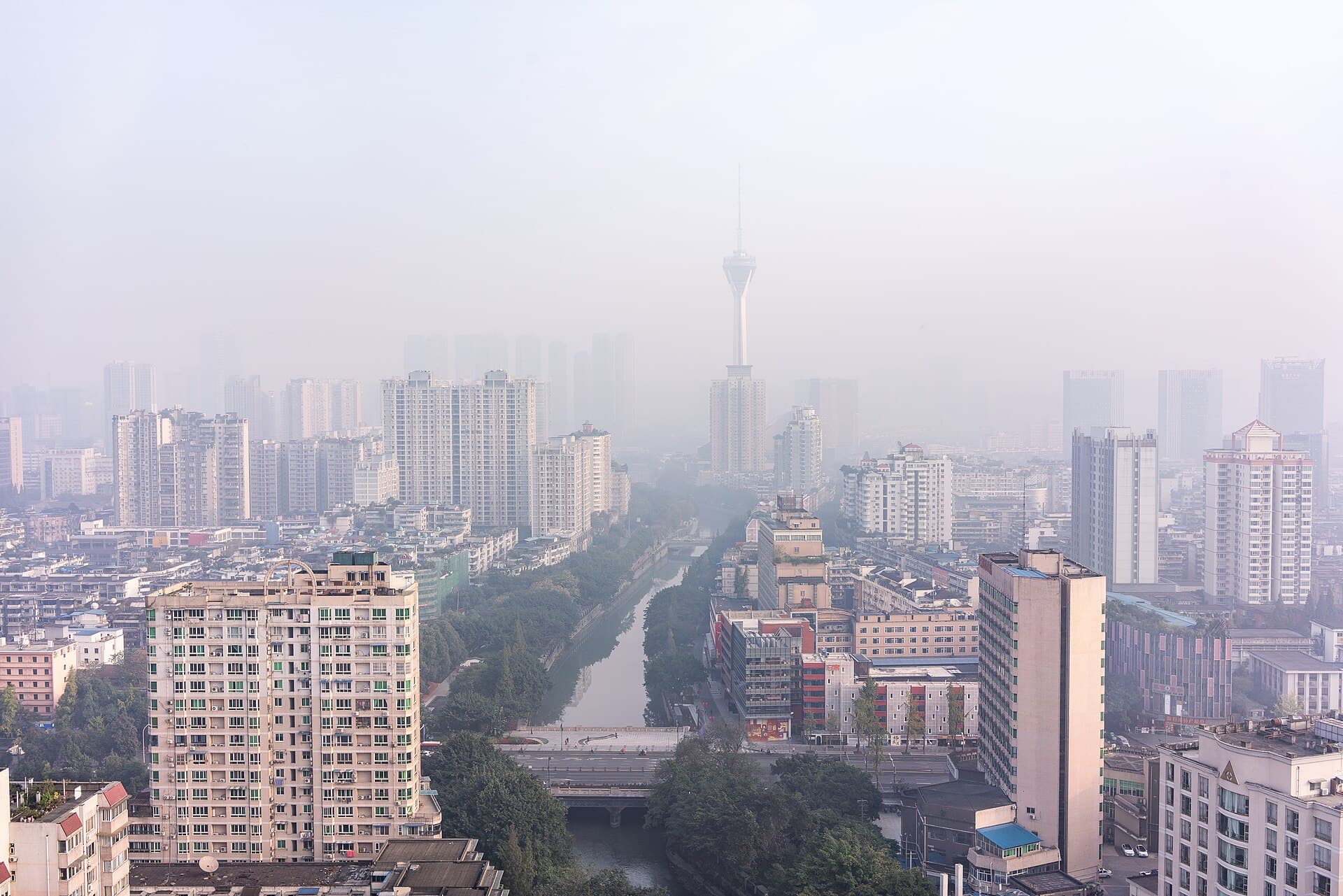 Chengdu's contemporary skyline through atmospheric morning mist